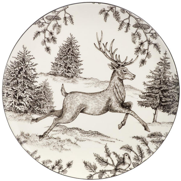 Decorative plate with a deer and forest design on a white background