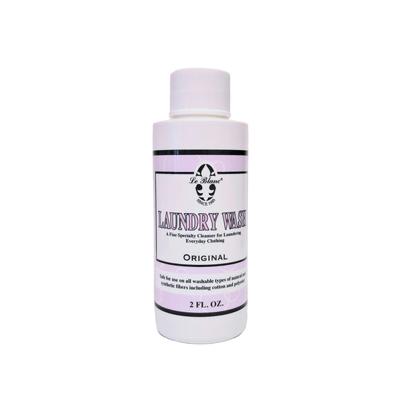 Bottle of Le Blanc laundry wash with a label on a white background
