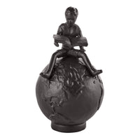 Brown Cast Iron Boy Reading on Globe Sculpture | Danya B.