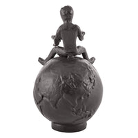Brown Cast Iron Boy Reading on Globe Sculpture | Danya B.
