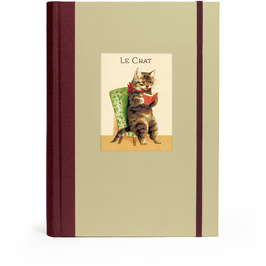 Notebook with a cat illustration and 'Le Chat' text on a beige cover with brown spine.