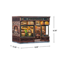A miniature shop or cabinet model shown on a white background with dimension lines and labels indicating 5.10 inches wide, 8.