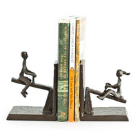 Children Playing on a See-Saw Metal Bookend Set | Danya B.