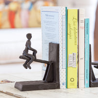 Children Playing on a See-Saw Metal Bookend Set | Danya B.