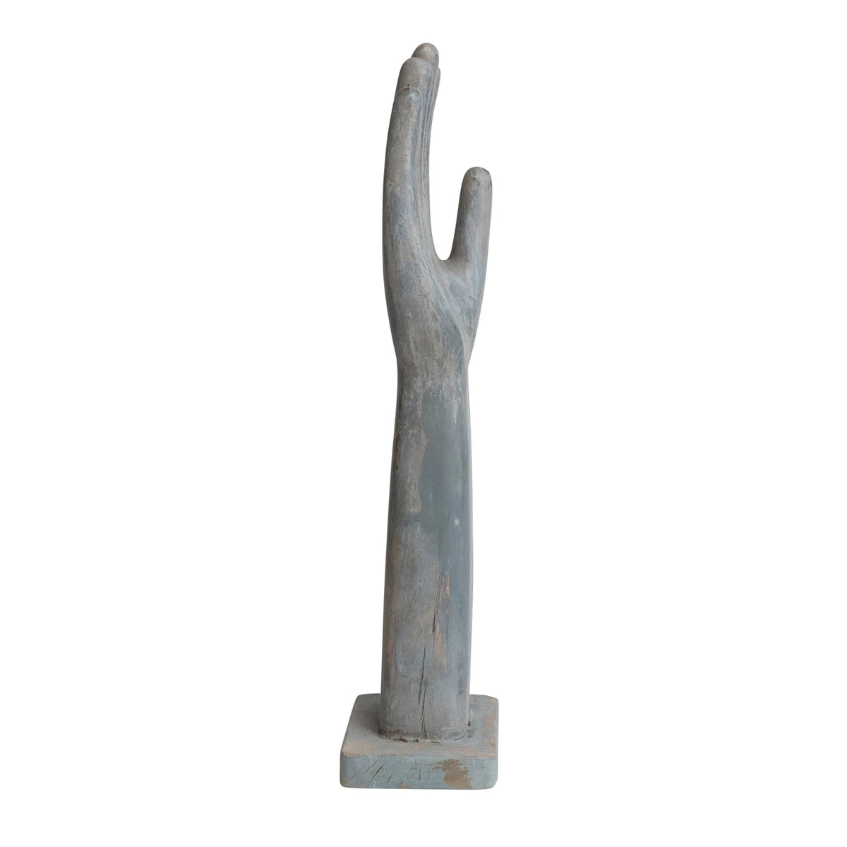 Decorative wooden arm sculpture on a white background