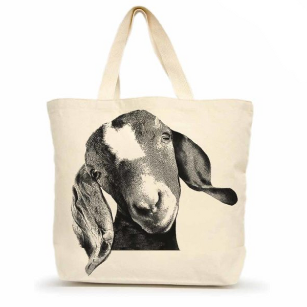 A canvas tote bag with a screen printed image of a goat's head on a beige background, featuring a black handle.