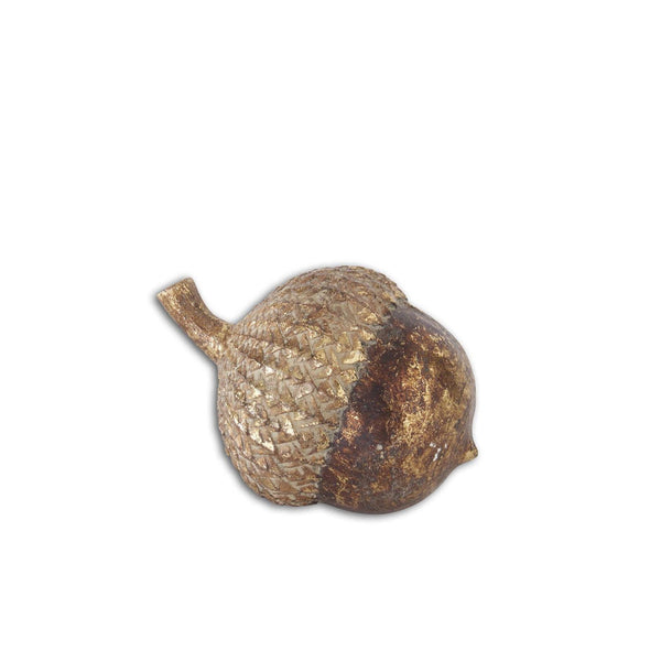 Decorative acorn with textured surface on a white background