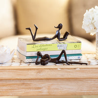 Man and Woman Leisurely Reading a Book Bronze Sculptures (2 Piece Set) | Danya B.