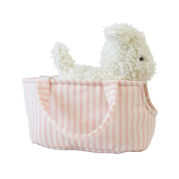 Plush toy duck in a pink and white striped bag on a white background