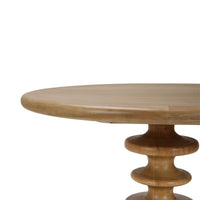 A close up of the top of a circular accent table.