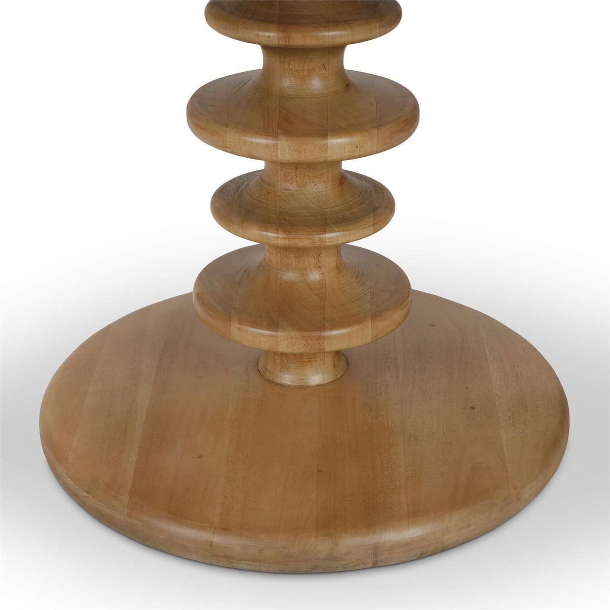 A close up of the base of a circular shaped accent table.