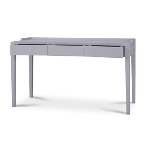 A gray rectangular desk with three drawers open slightly on a white background.