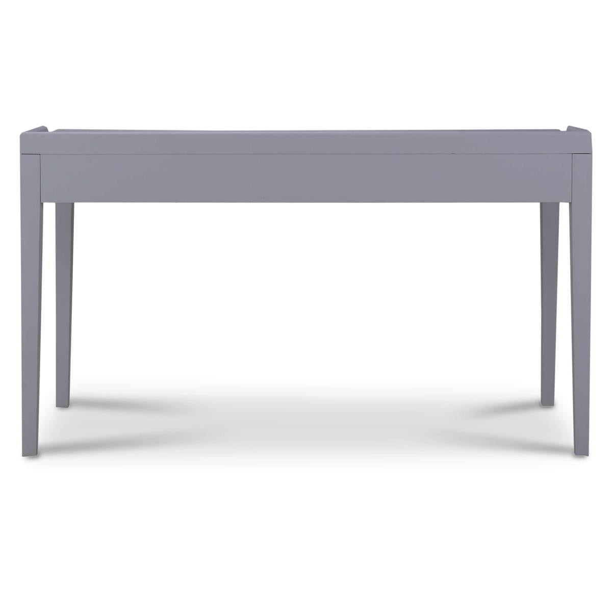 The back side of a gray rectangular desk with three drawers on a white background.
