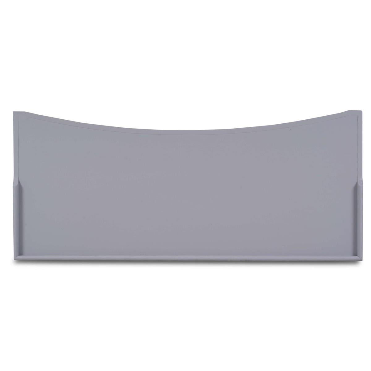 A top down view of a gray rectangular desk on a white background.