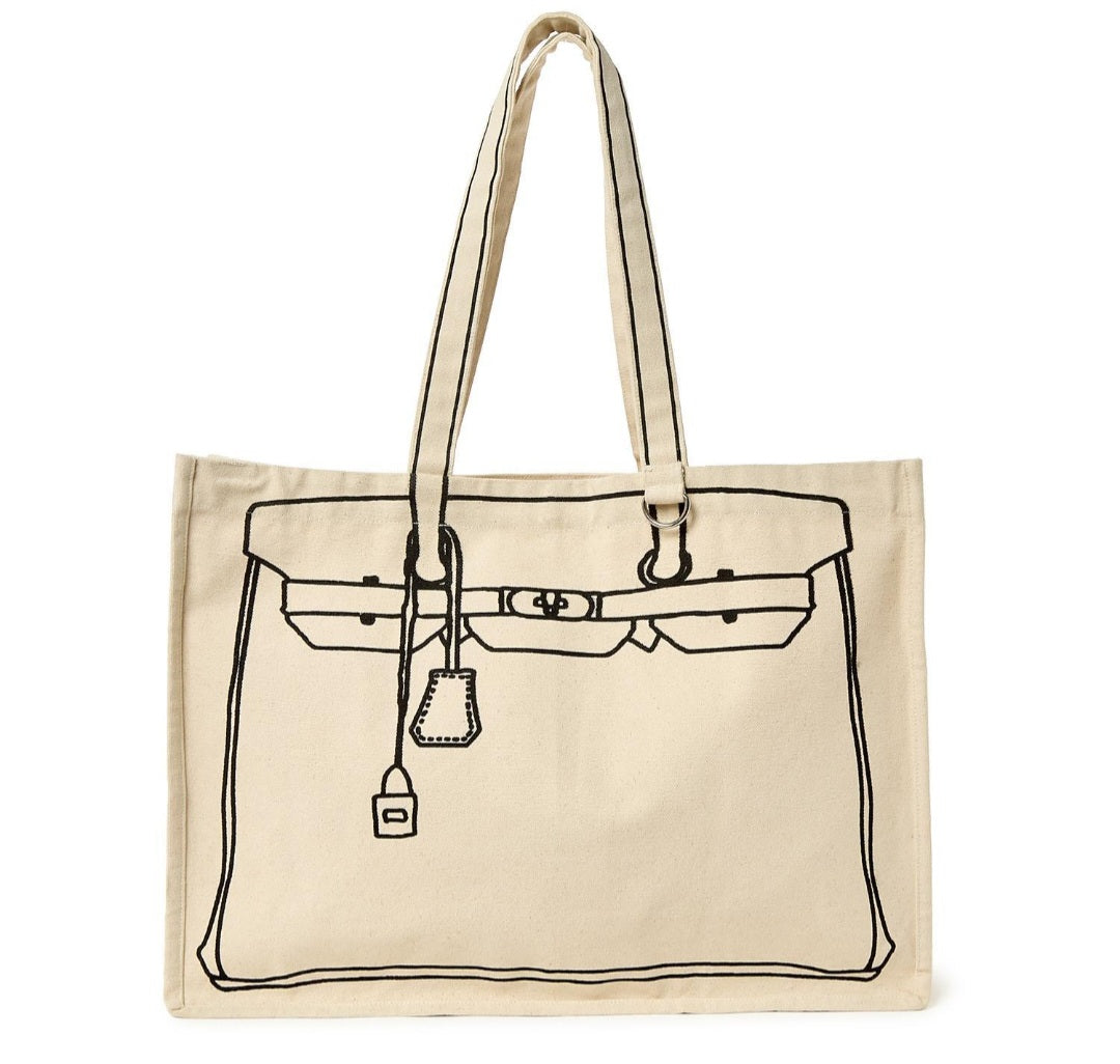 Beige tote bag with black line drawing of a handbag on a white background