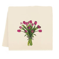 Beige towel with a pink tulip design on a white background